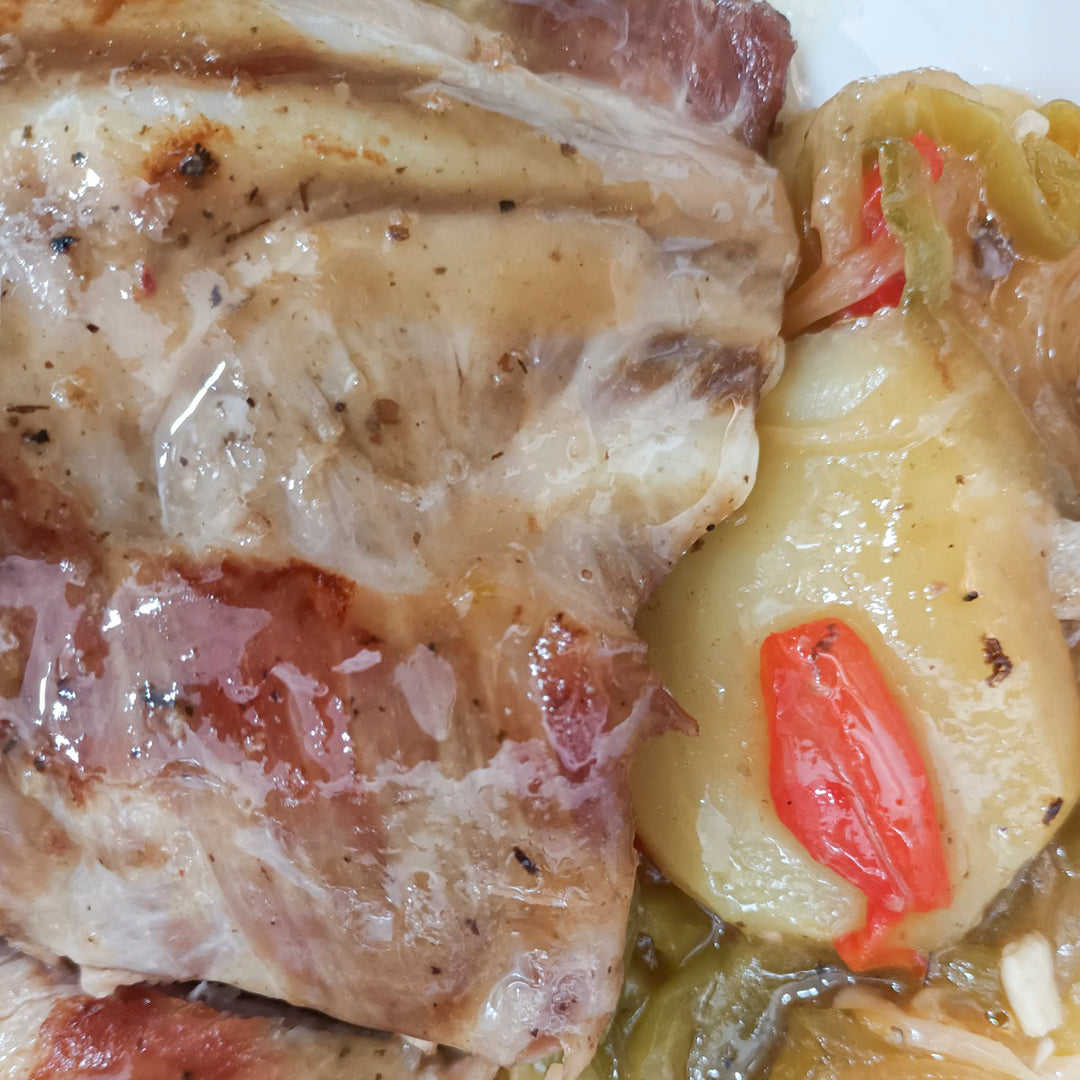 Costilla de cerdo con patatas a lo pobre - ensupuntoadomicilio